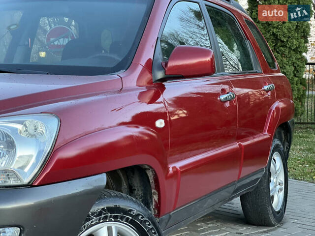 Червоний Кіа Sportage, об'ємом двигуна 2 л та пробігом 300 тис. км за 5999 $, фото 5 на Automoto.ua