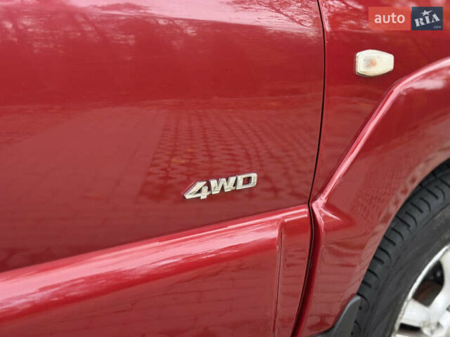 Красный Киа Sportage, объемом двигателя 2.66 л и пробегом 275 тыс. км за 7500 $, фото 9 на Automoto.ua