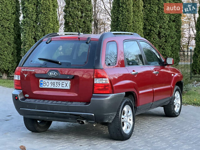 Червоний Кіа Sportage, об'ємом двигуна 2 л та пробігом 300 тис. км за 5999 $, фото 24 на Automoto.ua