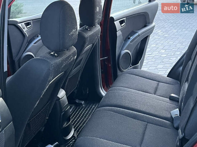 Червоний Кіа Sportage, об'ємом двигуна 2 л та пробігом 300 тис. км за 5999 $, фото 35 на Automoto.ua