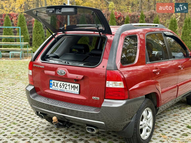 Красный Киа Sportage, объемом двигателя 2.66 л и пробегом 275 тыс. км за 7500 $, фото 24 на Automoto.ua