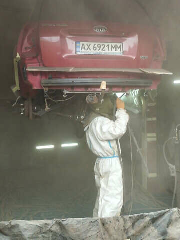 Красный Киа Sportage, объемом двигателя 2.66 л и пробегом 275 тыс. км за 7500 $, фото 58 на Automoto.ua