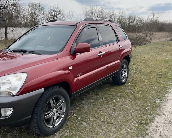 Красный Киа Sportage, объемом двигателя 1.99 л и пробегом 224 тыс. км за 7799 $, фото 25 на Automoto.ua