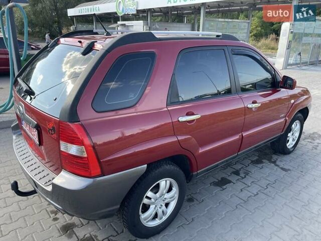Красный Киа Sportage, объемом двигателя 1.99 л и пробегом 224 тыс. км за 7799 $, фото 1 на Automoto.ua