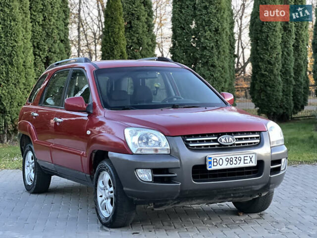 Червоний Кіа Sportage, об'ємом двигуна 2 л та пробігом 300 тис. км за 5999 $, фото 12 на Automoto.ua