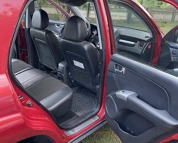Красный Киа Sportage, объемом двигателя 1.99 л и пробегом 224 тыс. км за 7799 $, фото 16 на Automoto.ua