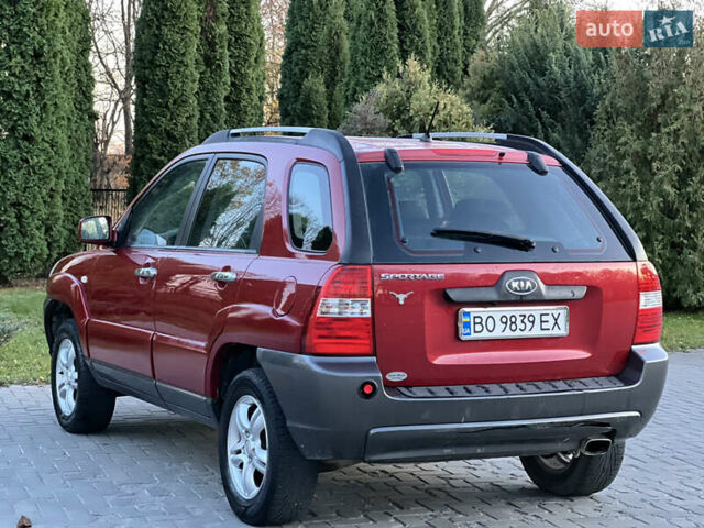 Червоний Кіа Sportage, об'ємом двигуна 2 л та пробігом 300 тис. км за 5999 $, фото 19 на Automoto.ua
