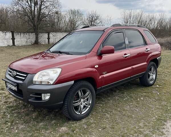 Красный Киа Sportage, объемом двигателя 1.99 л и пробегом 224 тыс. км за 7799 $, фото 22 на Automoto.ua