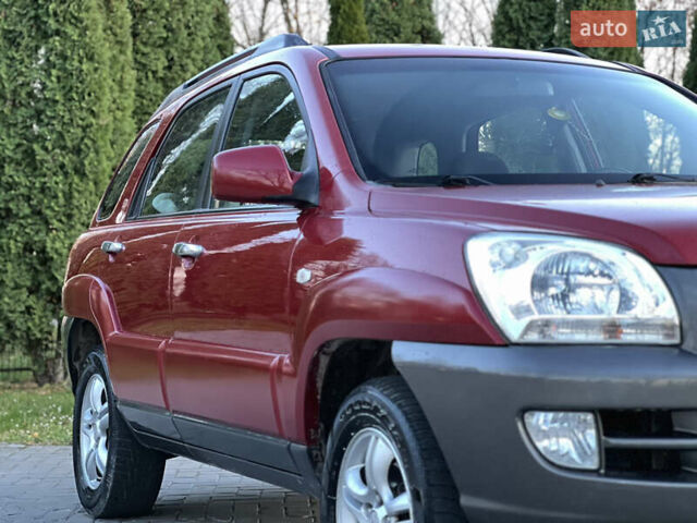 Червоний Кіа Sportage, об'ємом двигуна 2 л та пробігом 300 тис. км за 5999 $, фото 14 на Automoto.ua