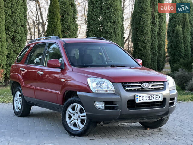 Червоний Кіа Sportage, об'ємом двигуна 2 л та пробігом 300 тис. км за 5999 $, фото 18 на Automoto.ua
