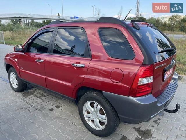 Красный Киа Sportage, объемом двигателя 1.99 л и пробегом 224 тыс. км за 7799 $, фото 8 на Automoto.ua