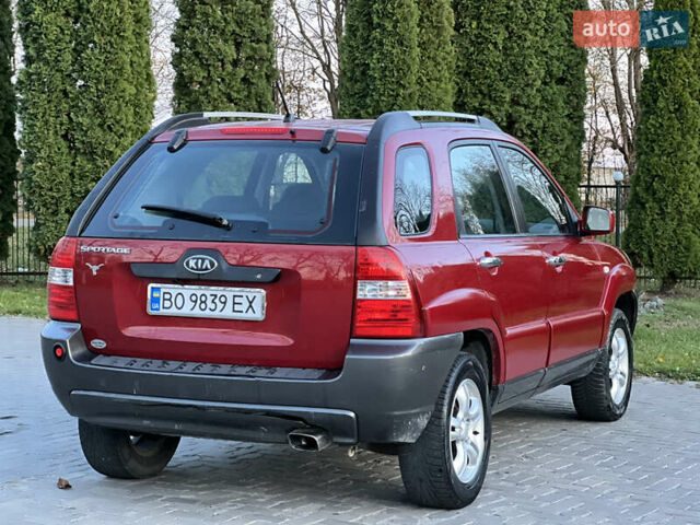 Червоний Кіа Sportage, об'ємом двигуна 2 л та пробігом 300 тис. км за 5999 $, фото 23 на Automoto.ua