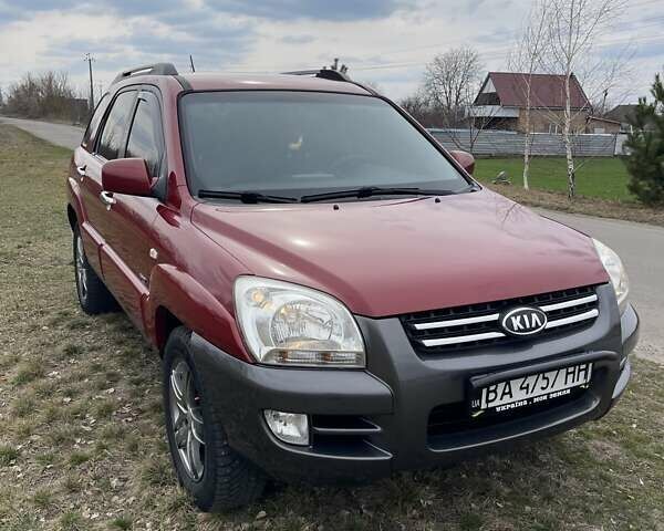 Красный Киа Sportage, объемом двигателя 1.99 л и пробегом 224 тыс. км за 7799 $, фото 2 на Automoto.ua