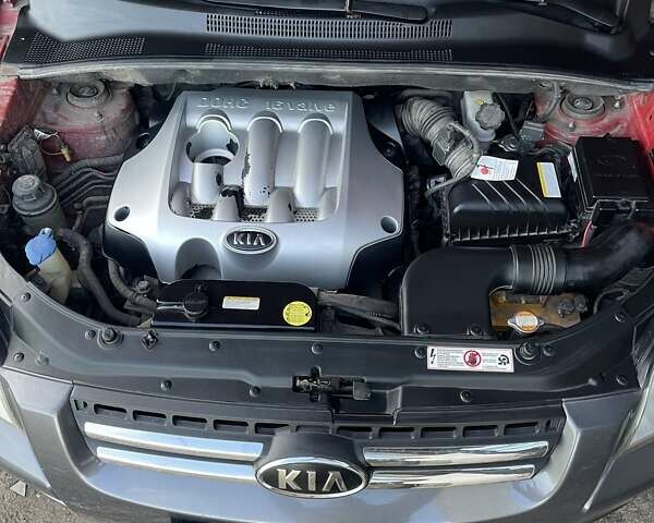 Красный Киа Sportage, объемом двигателя 1.99 л и пробегом 224 тыс. км за 7799 $, фото 12 на Automoto.ua