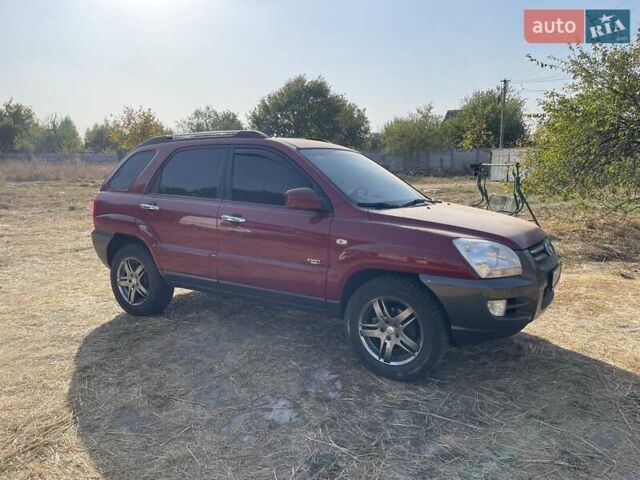 Красный Киа Sportage, объемом двигателя 1.99 л и пробегом 224 тыс. км за 7799 $, фото 20 на Automoto.ua