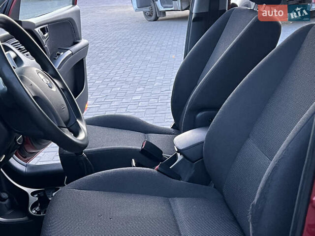Червоний Кіа Sportage, об'ємом двигуна 2 л та пробігом 300 тис. км за 5999 $, фото 26 на Automoto.ua