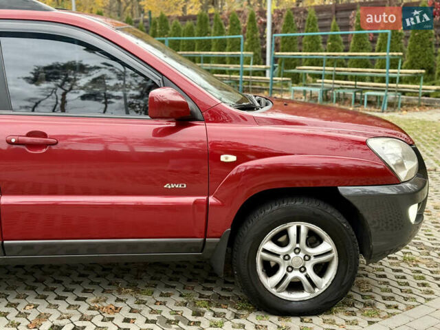 Красный Киа Sportage, объемом двигателя 2.66 л и пробегом 275 тыс. км за 7500 $, фото 26 на Automoto.ua