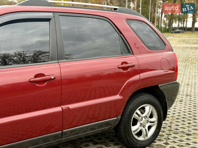 Красный Киа Sportage, объемом двигателя 2.66 л и пробегом 275 тыс. км за 7500 $, фото 19 на Automoto.ua