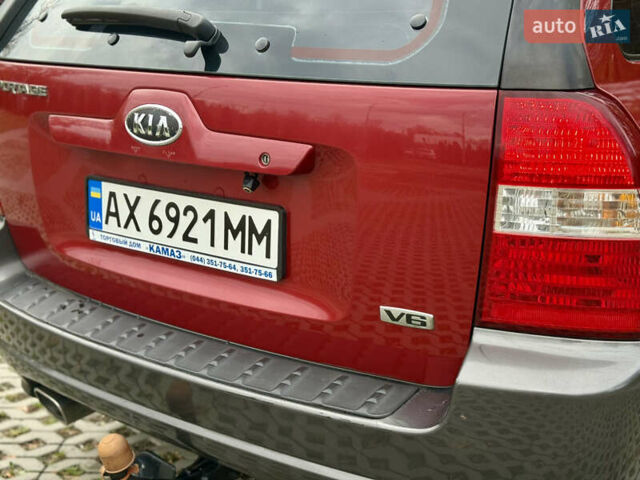 Красный Киа Sportage, объемом двигателя 2.66 л и пробегом 275 тыс. км за 7500 $, фото 14 на Automoto.ua