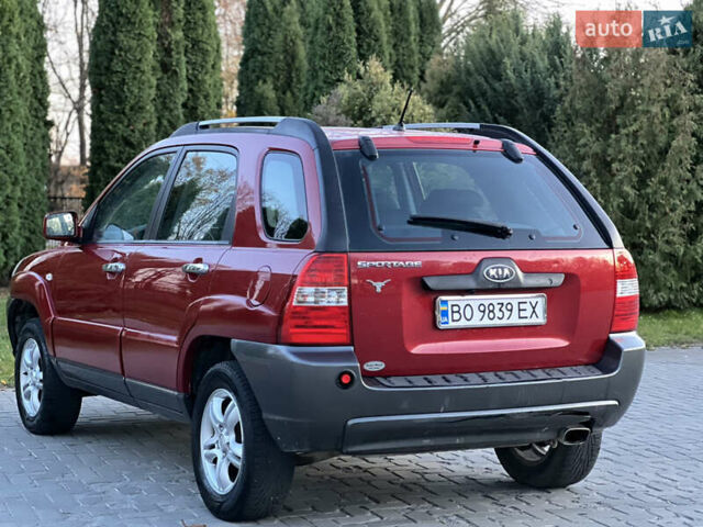 Червоний Кіа Sportage, об'ємом двигуна 2 л та пробігом 300 тис. км за 5999 $, фото 21 на Automoto.ua