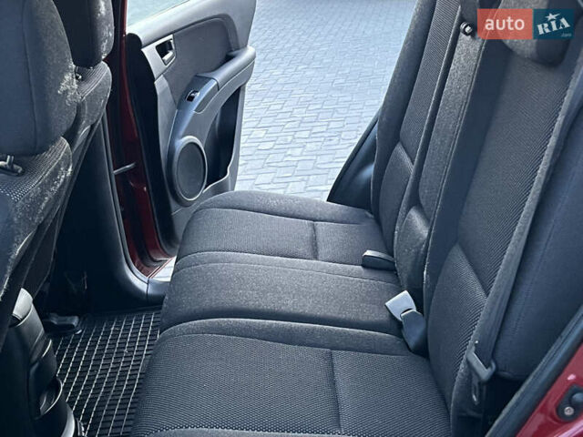 Червоний Кіа Sportage, об'ємом двигуна 2 л та пробігом 300 тис. км за 5999 $, фото 34 на Automoto.ua