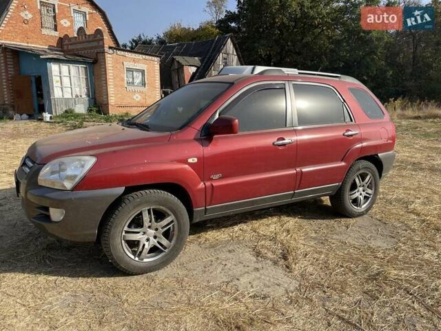 Красный Киа Sportage, объемом двигателя 1.99 л и пробегом 224 тыс. км за 7799 $, фото 21 на Automoto.ua
