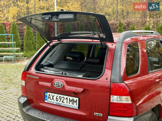 Красный Киа Sportage, объемом двигателя 2.66 л и пробегом 275 тыс. км за 7500 $, фото 25 на Automoto.ua