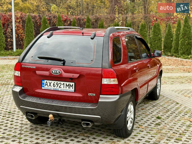 Красный Киа Sportage, объемом двигателя 2.66 л и пробегом 275 тыс. км за 7500 $, фото 11 на Automoto.ua
