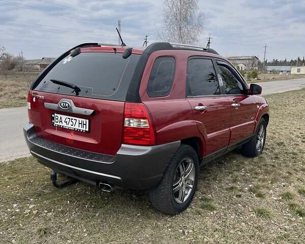 Красный Киа Sportage, объемом двигателя 1.99 л и пробегом 224 тыс. км за 7799 $, фото 27 на Automoto.ua