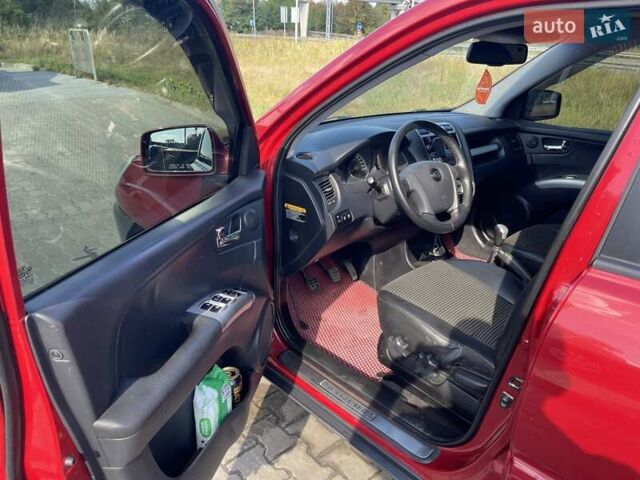 Красный Киа Sportage, объемом двигателя 1.99 л и пробегом 224 тыс. км за 7799 $, фото 14 на Automoto.ua
