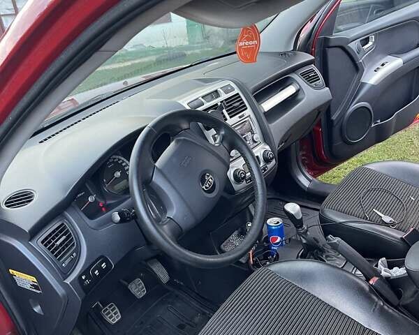 Красный Киа Sportage, объемом двигателя 1.99 л и пробегом 224 тыс. км за 7799 $, фото 23 на Automoto.ua