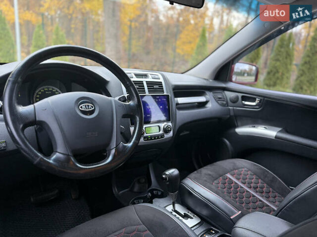 Красный Киа Sportage, объемом двигателя 2.66 л и пробегом 275 тыс. км за 7500 $, фото 46 на Automoto.ua