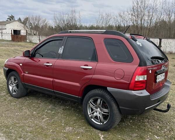 Красный Киа Sportage, объемом двигателя 1.99 л и пробегом 224 тыс. км за 7799 $, фото 24 на Automoto.ua