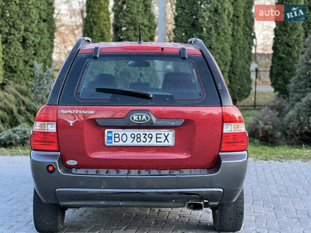 Червоний Кіа Sportage, об'ємом двигуна 2 л та пробігом 300 тис. км за 5999 $, фото 22 на Automoto.ua