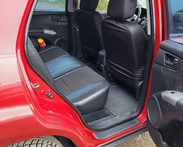 Красный Киа Sportage, объемом двигателя 1.98 л и пробегом 226 тыс. км за 7400 $, фото 3 на Automoto.ua