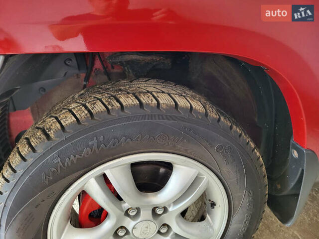 Красный Киа Sportage, объемом двигателя 1.98 л и пробегом 226 тыс. км за 7400 $, фото 6 на Automoto.ua