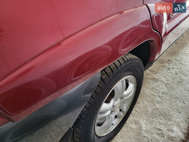 Красный Киа Sportage, объемом двигателя 1.98 л и пробегом 226 тыс. км за 7400 $, фото 5 на Automoto.ua