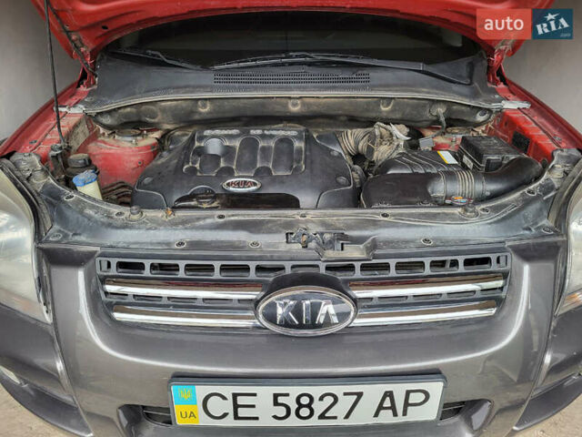 Красный Киа Sportage, объемом двигателя 1.98 л и пробегом 226 тыс. км за 7400 $, фото 25 на Automoto.ua