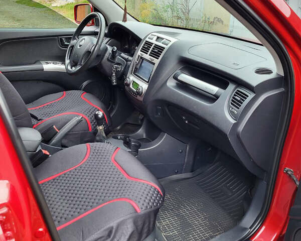 Красный Киа Sportage, объемом двигателя 1.98 л и пробегом 226 тыс. км за 7400 $, фото 12 на Automoto.ua