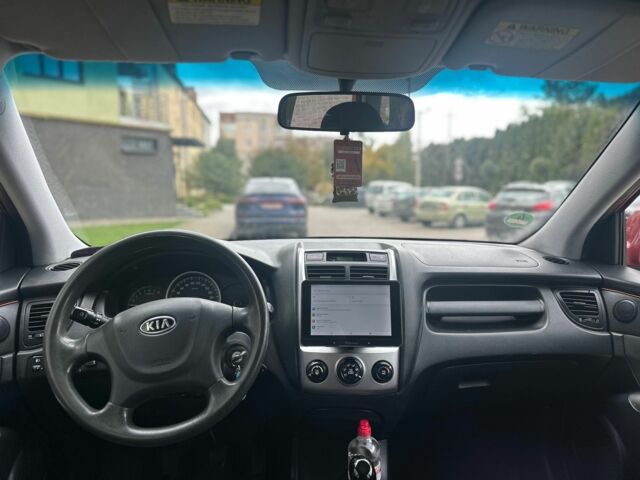 Красный Киа Sportage, объемом двигателя 2 л и пробегом 222 тыс. км за 8500 $, фото 2 на Automoto.ua