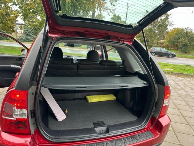 Красный Киа Sportage, объемом двигателя 2 л и пробегом 222 тыс. км за 8500 $, фото 12 на Automoto.ua