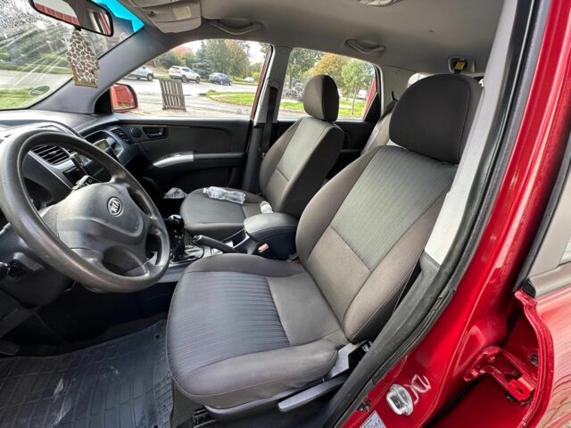 Красный Киа Sportage, объемом двигателя 2 л и пробегом 222 тыс. км за 8500 $, фото 20 на Automoto.ua