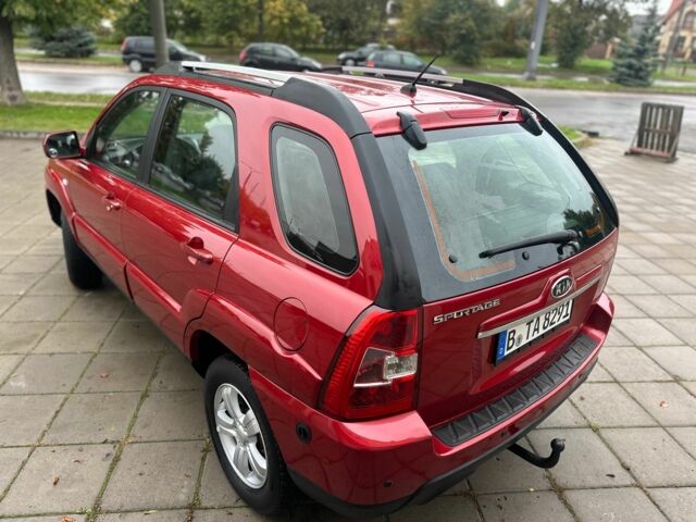Красный Киа Sportage, объемом двигателя 2 л и пробегом 222 тыс. км за 8500 $, фото 17 на Automoto.ua