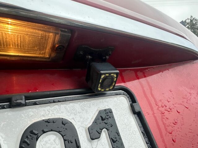 Красный Киа Sportage, объемом двигателя 2 л и пробегом 222 тыс. км за 8500 $, фото 11 на Automoto.ua