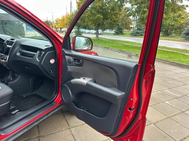 Красный Киа Sportage, объемом двигателя 2 л и пробегом 222 тыс. км за 8500 $, фото 22 на Automoto.ua