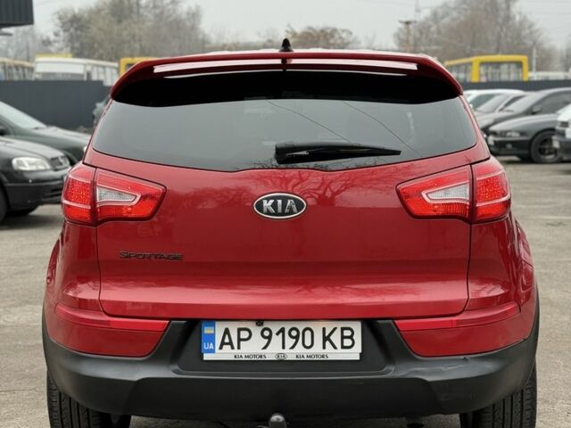 Красный Киа Sportage, объемом двигателя 2.4 л и пробегом 280 тыс. км за 9700 $, фото 4 на Automoto.ua