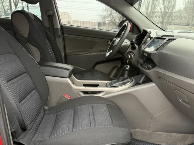 Красный Киа Sportage, объемом двигателя 2.4 л и пробегом 280 тыс. км за 9700 $, фото 7 на Automoto.ua