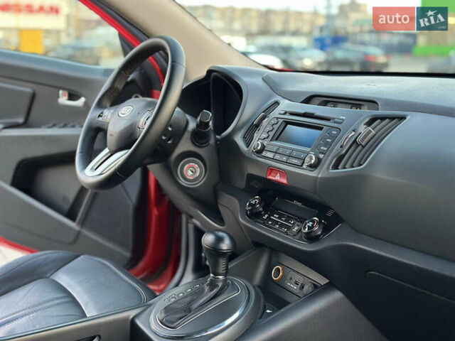 Червоний Кіа Sportage, об'ємом двигуна 2 л та пробігом 150 тис. км за 13500 $, фото 47 на Automoto.ua