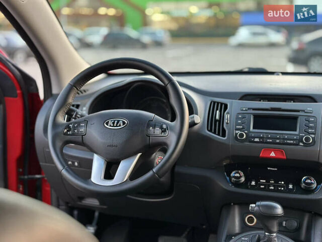 Червоний Кіа Sportage, об'ємом двигуна 2 л та пробігом 150 тис. км за 13500 $, фото 57 на Automoto.ua
