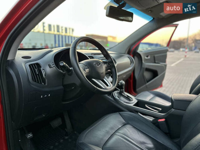 Червоний Кіа Sportage, об'ємом двигуна 2 л та пробігом 150 тис. км за 13500 $, фото 54 на Automoto.ua